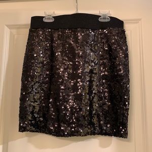 Black sequin mini skirt. Arden B. Elastic waistband. Size: medium.